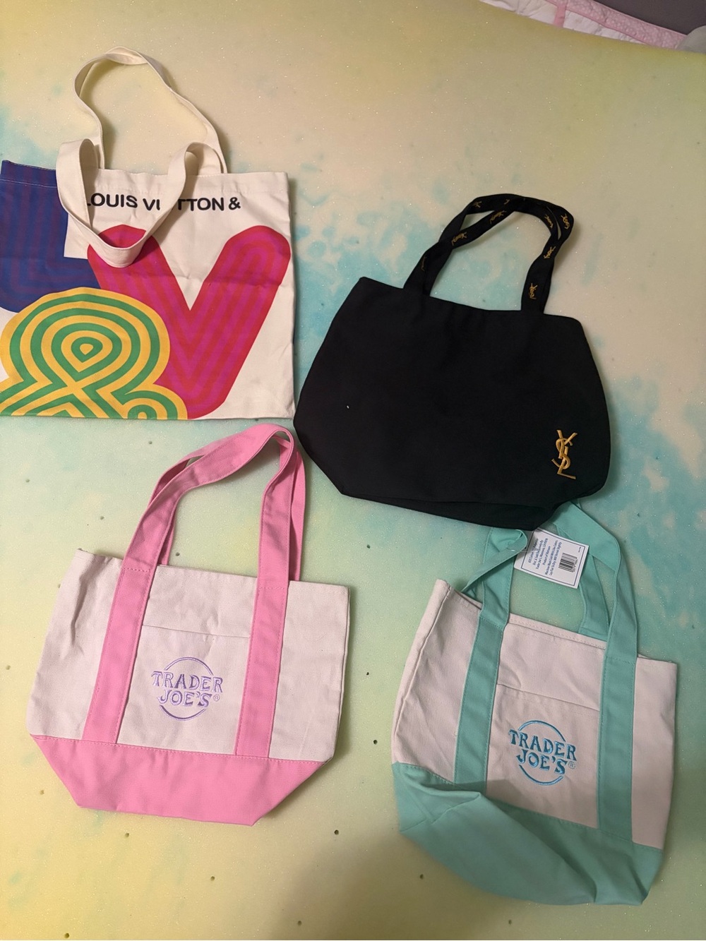Trade joe’s and Yves Saint Laurent and LV Tote bags
